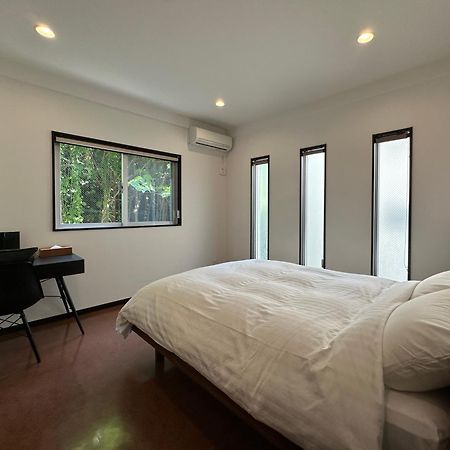 White Reef Apartment Uruma Bagian luar foto