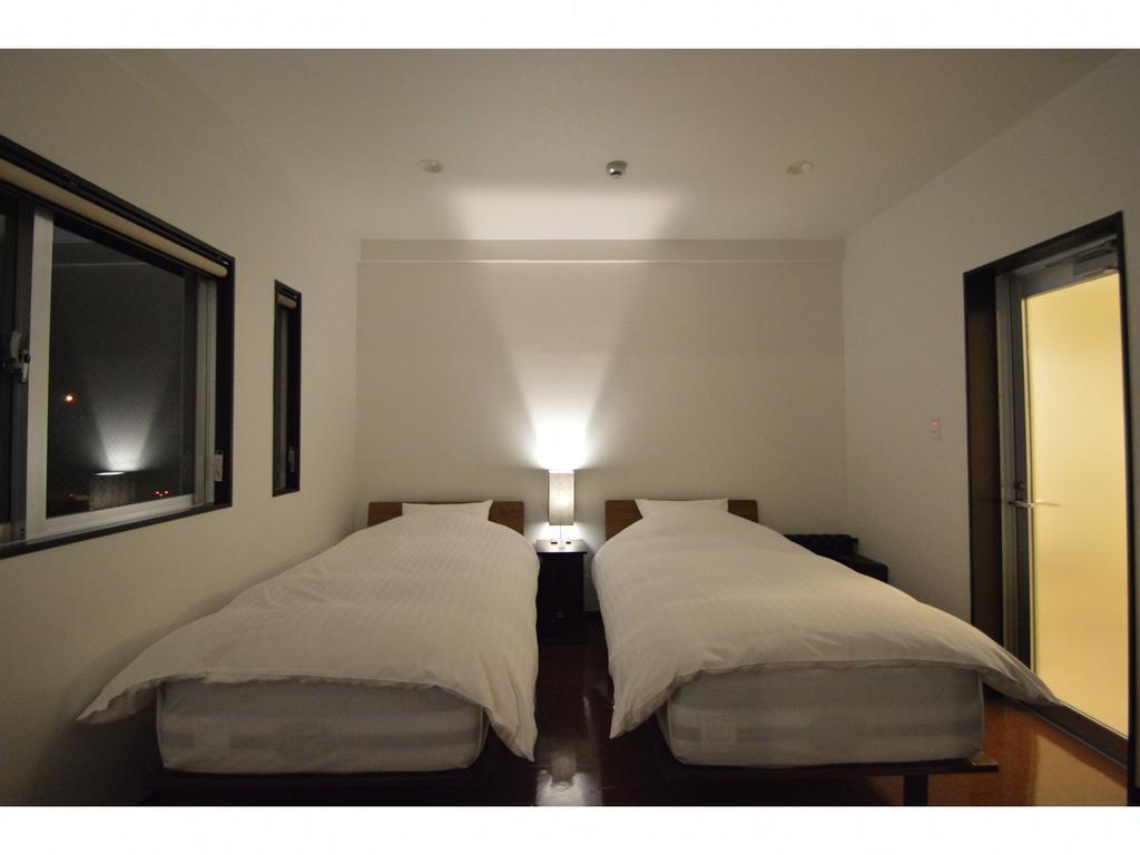 White Reef Apartment Uruma Bagian luar foto